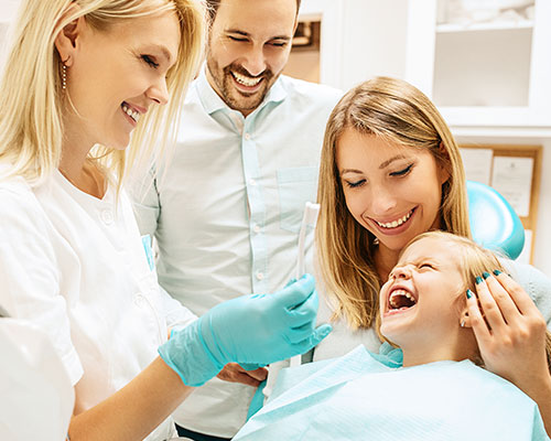 child receiving dental treatment